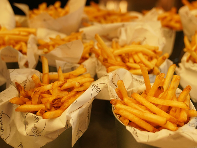 French fries at the SMASHER&CO restaurant, which is a great side dish with SMASH burgers