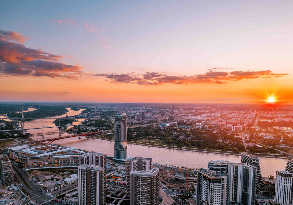 A view of the river and the sunset over Belgrade Waterfront, as well as a view of the Galerija shopping center