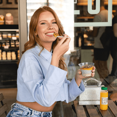 A girl enjoys a healthy breakfast at the LULU bakery