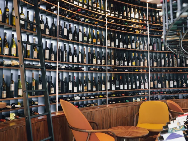 Seats for wine tasting inside Decanter wine shop in Belgrade Waterfront