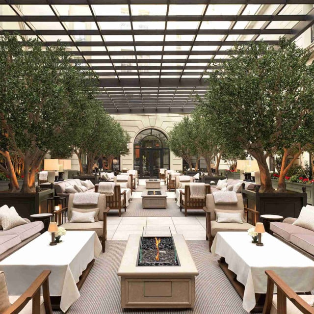 Landscaped courtyard of Hotel Bristol with seating area